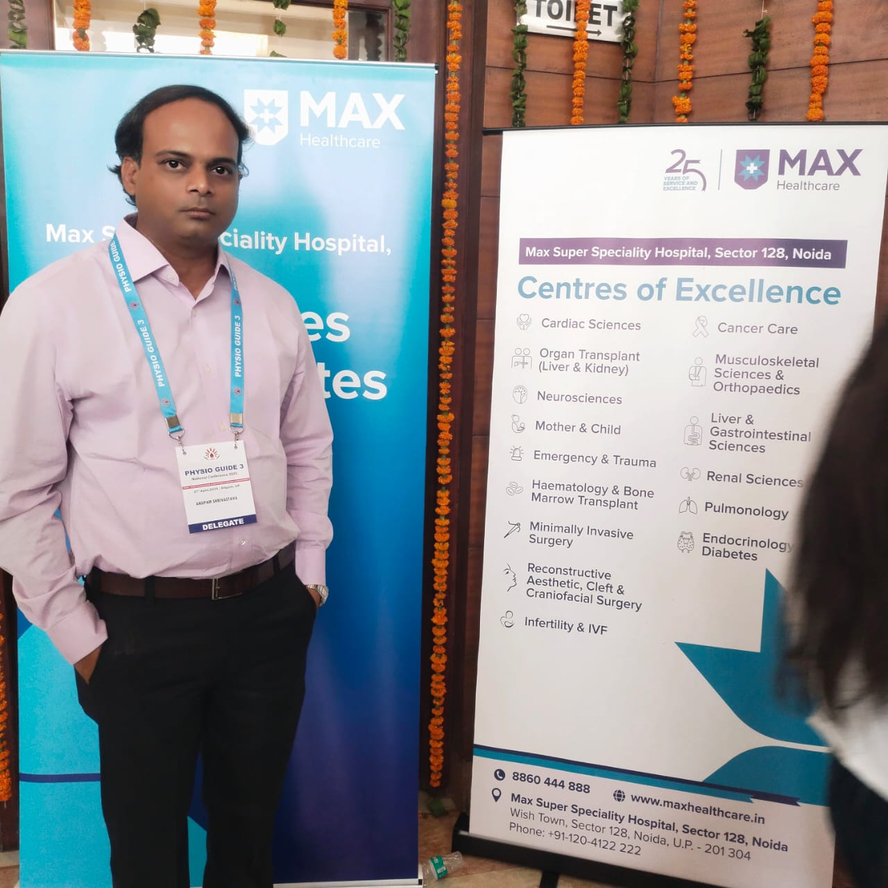 Dr. Anupam Shrivastava with hospital services chart